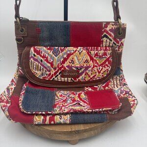 Sakroots Artist Circle Flap Crossbody bag in a multi-colored patchwork print Can
